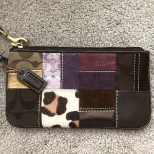 Brown and purple Coach wristlet.
